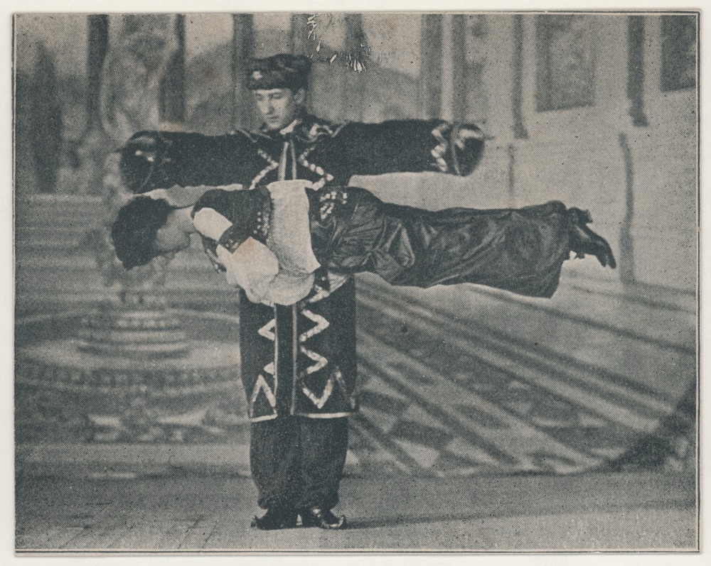 an vintage early photograph of Thurston the Famous magician suspending a women in mid-air by magic.